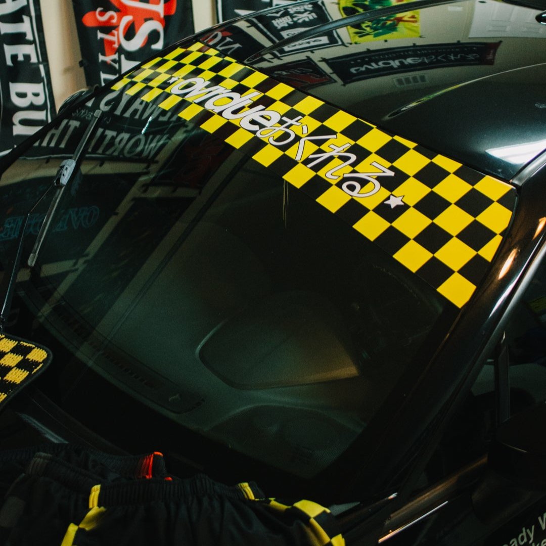 CHECKERED SUNSTRIP BANNER