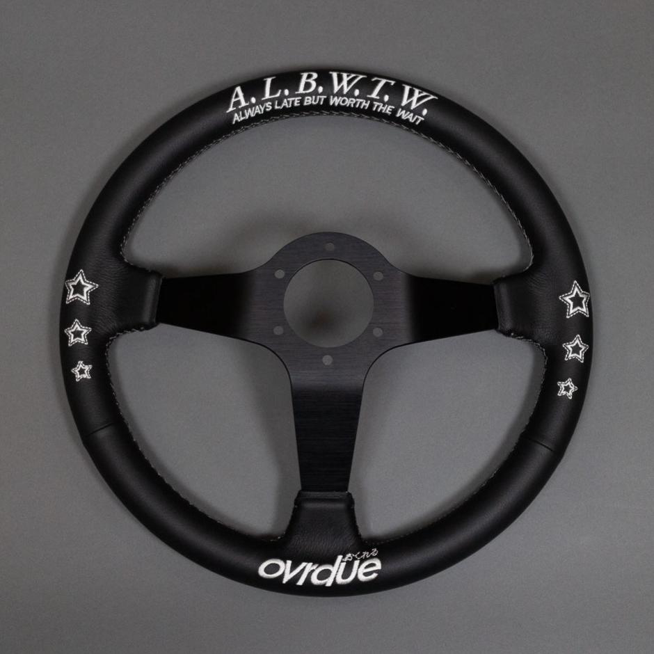 NEVER ON TIME STEERING WHEEL
